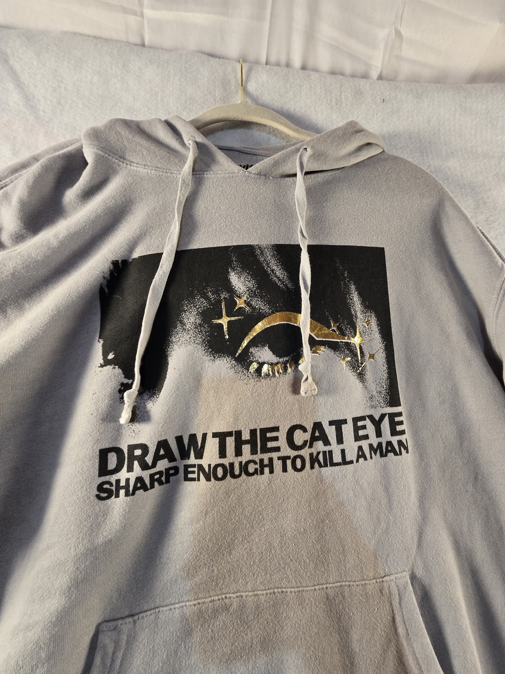 Taylor Swift Light Gray Hoodie with Black & Gold Cat-Eye Graphic